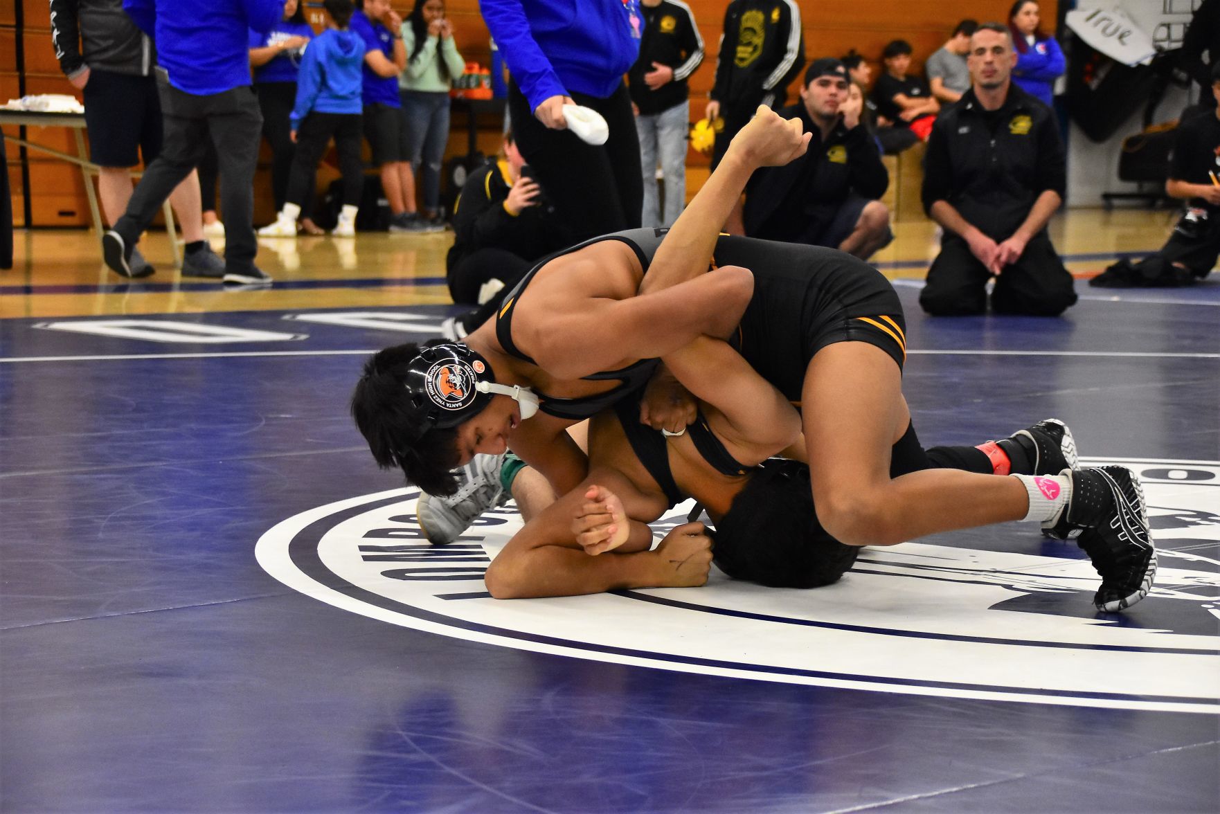 Santa Ynez Armando Contreras (Top) controls Xavier Reyes of Cabrillo